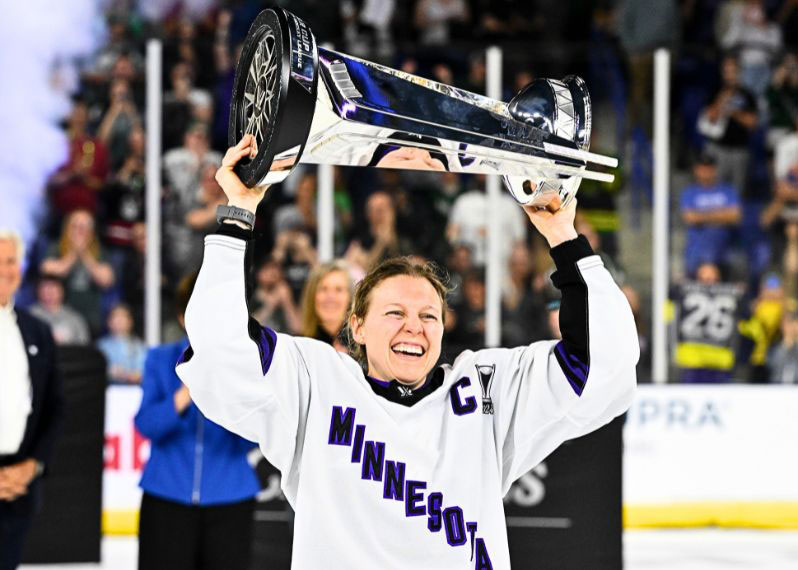  PWHL Minnesota captain Kendall Coyne Schofield hoists the Walter Cup after a game five victory over PWHL Boston during the Walter Cup Final on March 29, 2024. Photo Credit: Brian Fluharty